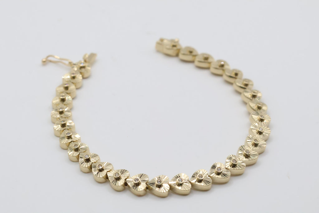 Manillas 14kt Size 9.95mm x 61/2 Weight 9.97g