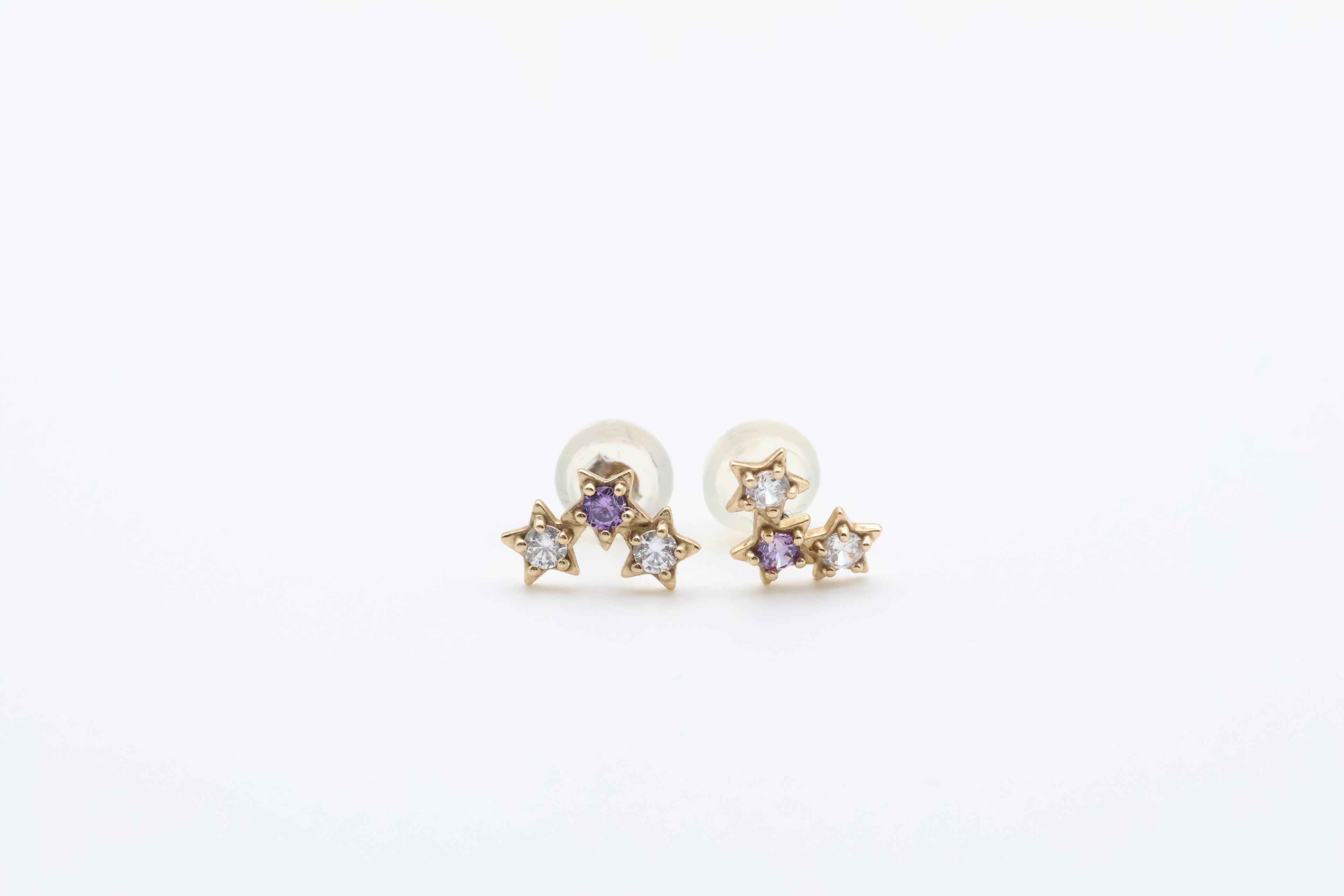 Aretes Estrellas 14kt zirconia, Blanco y Morado Size 9mm