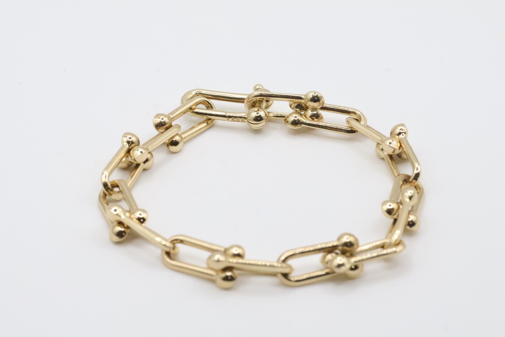 Manillas 14kt Size 7mm x 8" Weight 8.9g